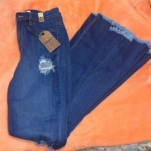 ✨BRAND NEW PAIR OF BELL BOTTOM RIPPED JEANS✨